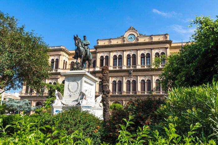 Poster Palermo, Italy - May 9, 2018: Facade of Building of Palermo Centrale, main railway station of the Italian city of Palermo, capital of Sicily. One of the most important stations of Italy