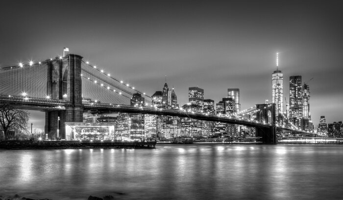 Poster Panorama van New York City met de Brooklyn Bridge bij nacht