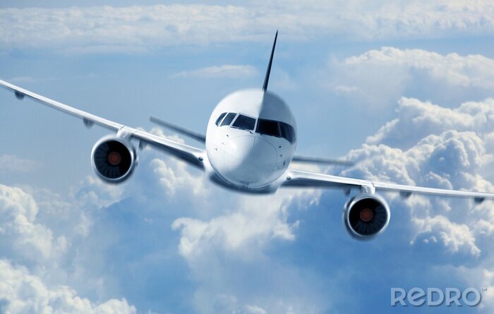 Poster Passenger Airliner vliegen in de wolken