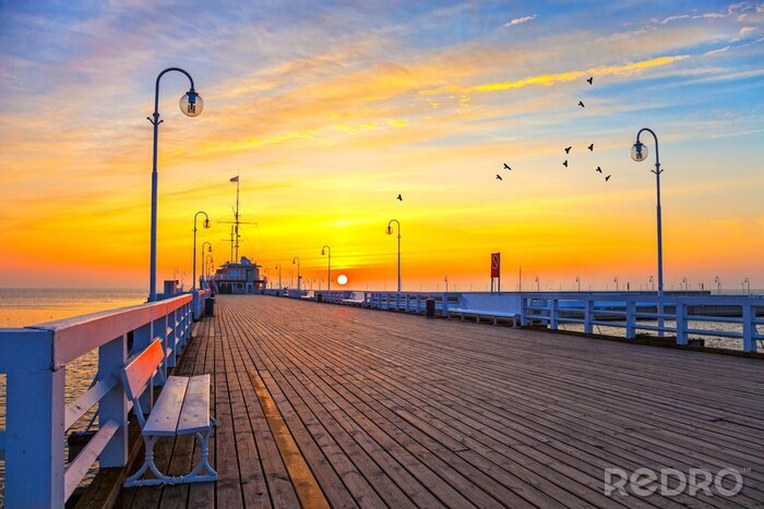 Poster Pier over de zee in de avond