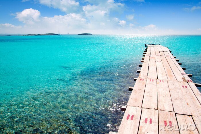 Poster Pier over een turquoise zee