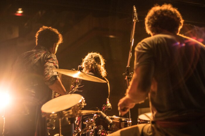 Poster playing music