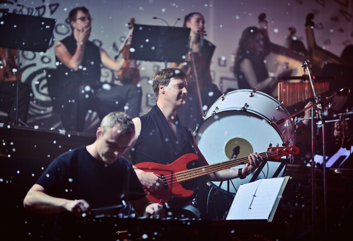 Poster Prestaties van popgroep en orkest.