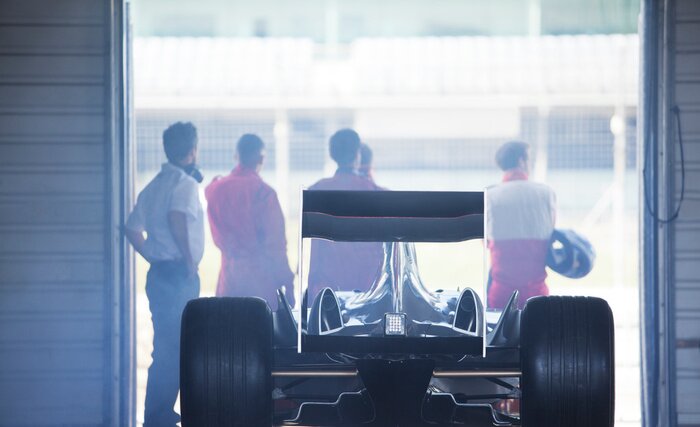 Poster Racing team working at pit stop