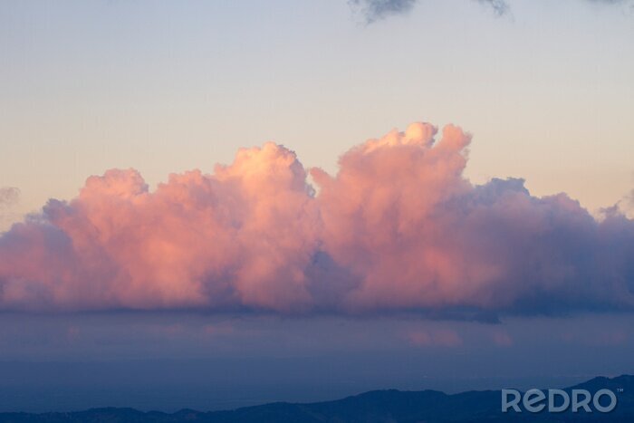 Poster Roze wolken in de lucht