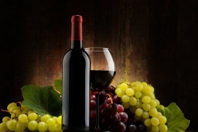 Poster Samenstelling met glas, fles rode wijn en verse druiven