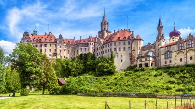 Sigmaringen Castle in summer, Germany. This famous Gothic castle is a landmark of Baden-Wurttemberg. Panorama of old German castle on a hill. Scenic view of beautiful medieval palace on sunny day.