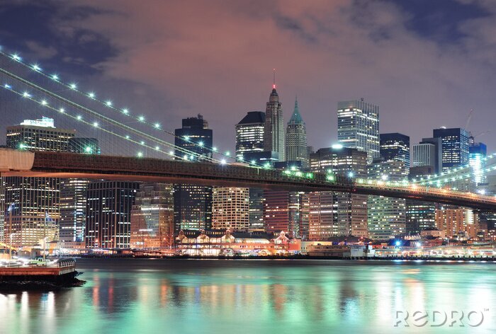 Poster Skyline van New York City bij nacht