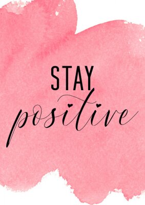Sticker Stay positive. Inspiring quote with pink watercolor background