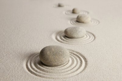 Stenen en patronen op zand