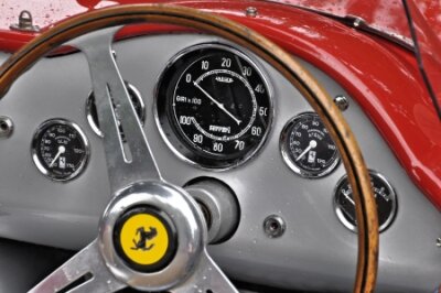 Poster Stuurwiel en dashboard in een retro rode Ferrari