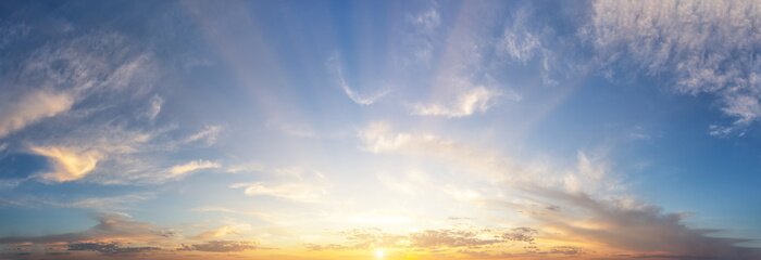 Poster Sunset cloudy sky with the orange sun