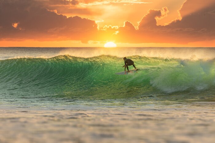 Poster Surfer Surfing at Sunrise