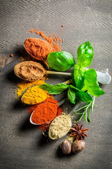 Poster Tasty condiments on old table