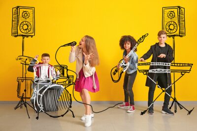 Poster Teenage musicians with drawing instruments playing against color wall