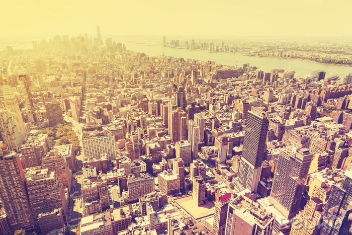 Poster Vintage gefilterde afbeelding van zonsondergang over Manhattan, USA.
