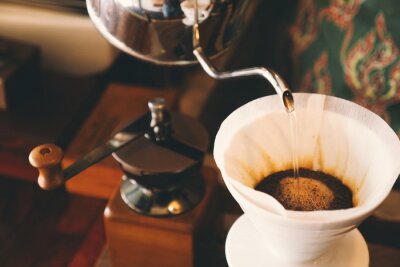 Poster vintage kleurtoon: Kop van koffie in de coffeeshop