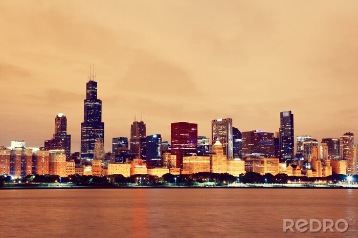 Poster Vintage skyline van Chicago bij nacht