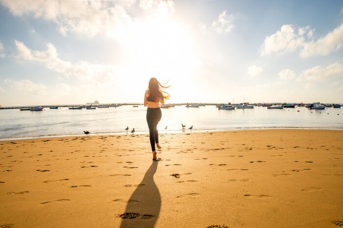 Poster Vrouw die op het strand
