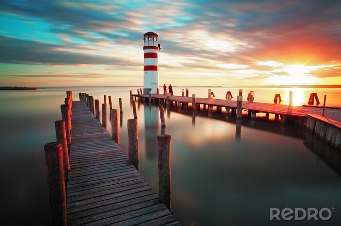 Poster Vuurtoren aan een rustig meer