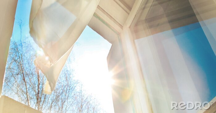 Poster Window is open wind blows curtain sun shining through window