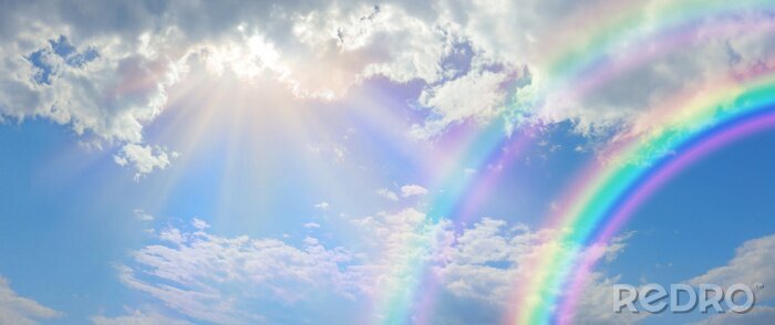 Poster Wolken met een dubbele regenboog