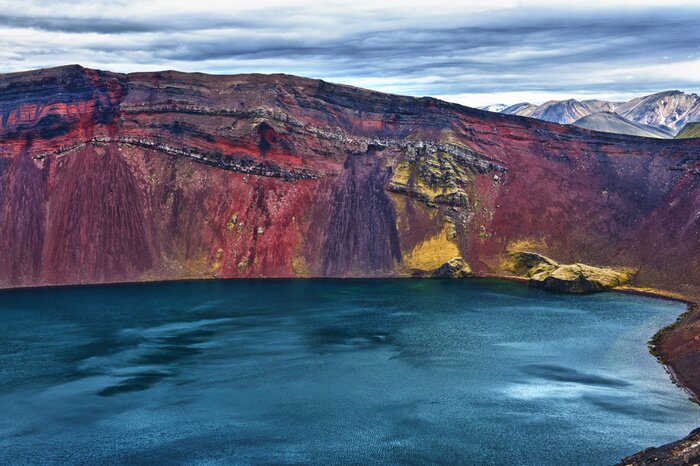 Poster Zeelandschap met een rotsachtige helling