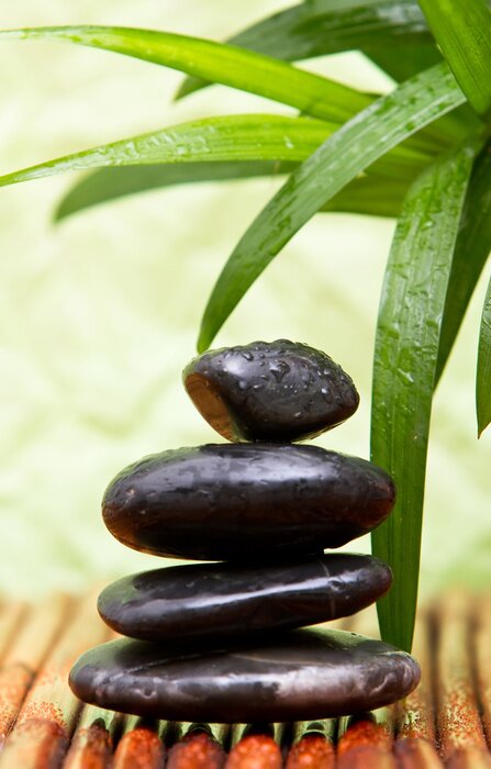 Poster Zenstenen op een bamboemat