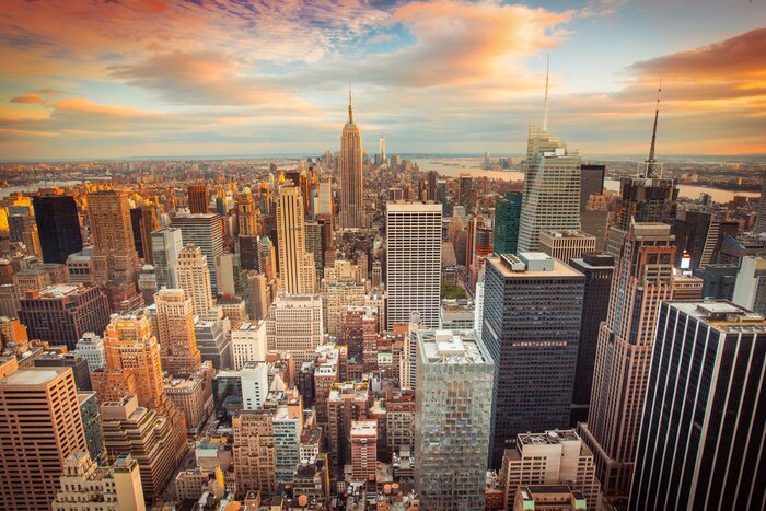 Poster Zonsondergang in New York City Manhattan vanuit de lucht