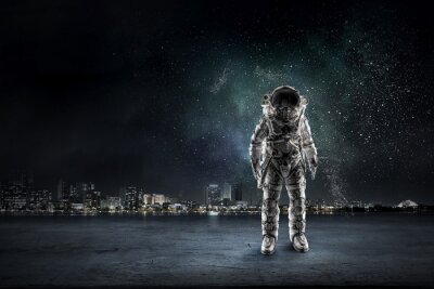 Sticker Astronaut tegen de achtergrond van een kosmische stad