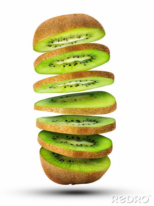 Sticker Fresh sliced kiwi fruit flying in the air isolated on white.
