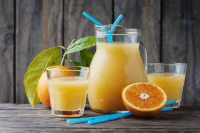 Sticker Gezonde verse jus d'orange op de woodent tafel