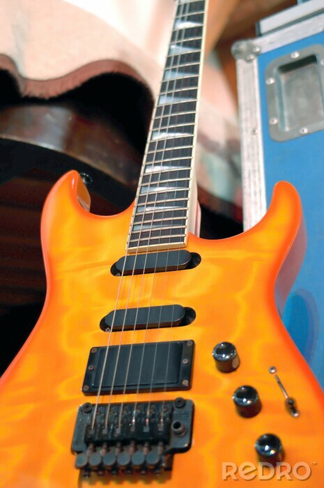 Sticker Muziek en een oranje gitaar