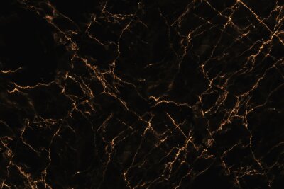 Oranje krassen op zwart marmer
