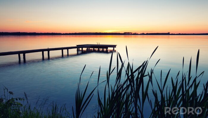 Sticker Pier in de avondhemel