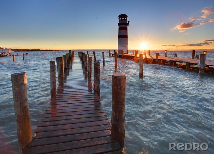 Sticker Pieren met een vuurtoren op de achtergrond