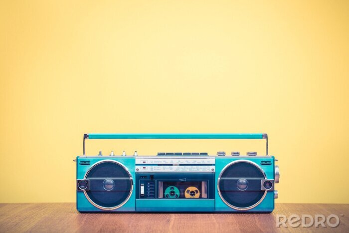 Sticker Retro verouderde draagbare stereo mint groene radio cassette recorder van 80s voor geel achtergrond. Vintage oude stijl gefiltreerde foto