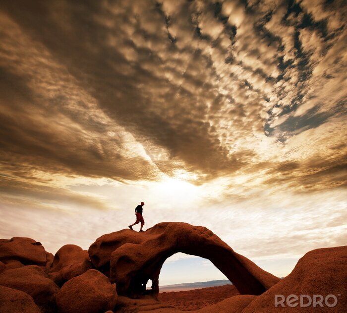 Sticker Sportklimmen op een rotsachtige boog