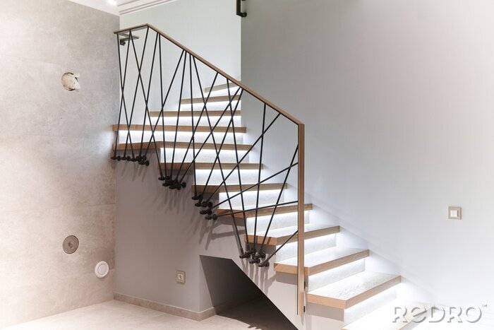 Sticker Stairs to the top. Design stairs made of metal and wood. backed up. Metal railing in black