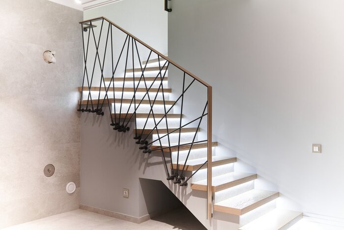 Sticker Stairs to the top. Design stairs made of metal and wood. backed up. Metal railing in black