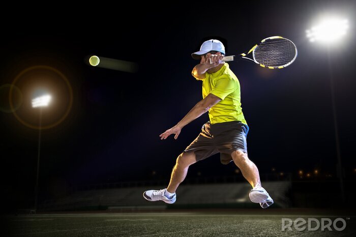 Sticker Tennis speler tijdens een wedstrijd in de nacht