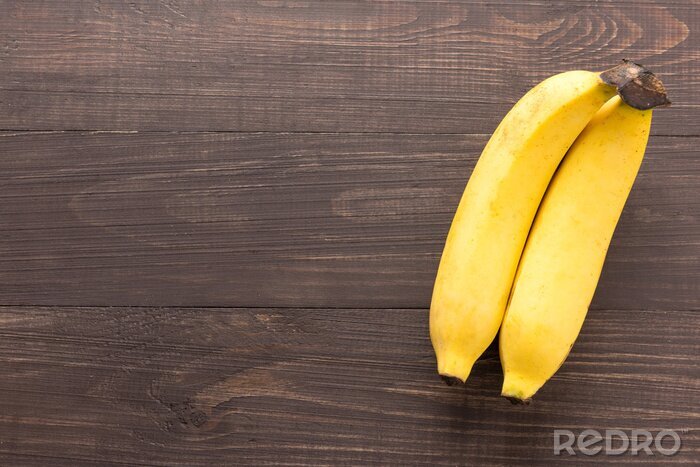 Sticker Twee bananen op houten planken