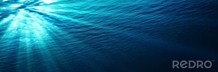Sticker underwater - blue shining in deep of the sea