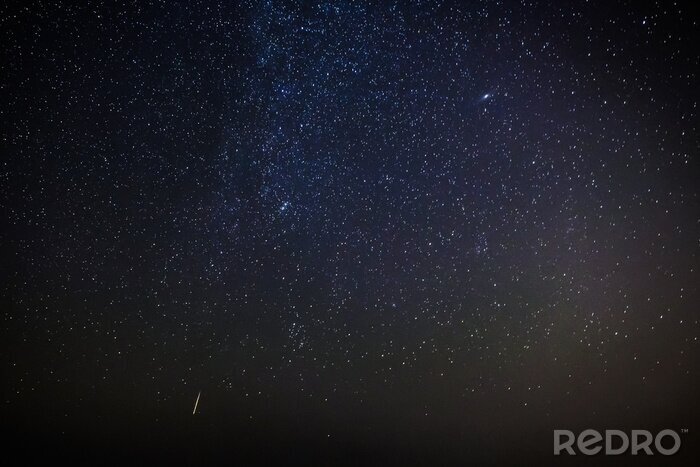 Sticker Vallende ster op de achtergrond van de kosmos