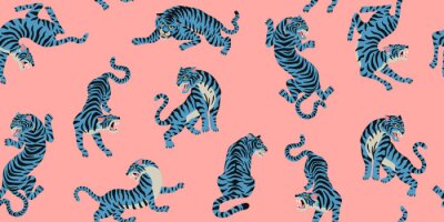 Behang Vector seamless pattern with cute tigers on the pink background. Fashionable fabric design.