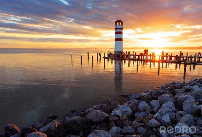 Sticker Vuurtoren op een rotsachtig strand
