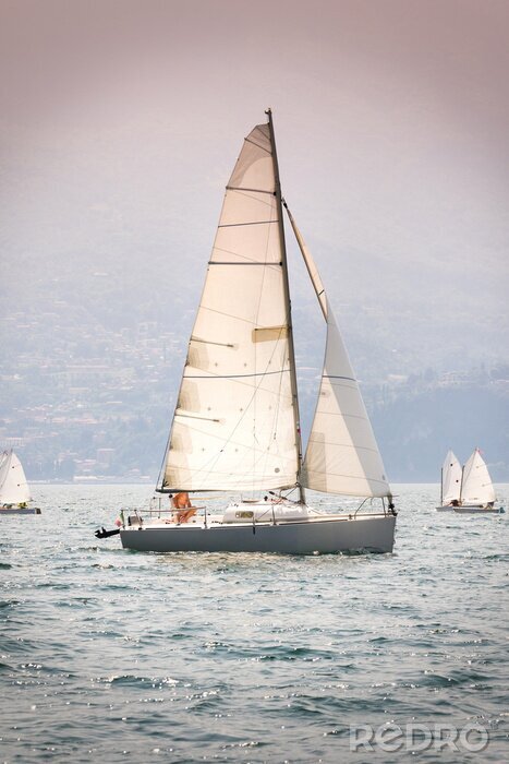 Sticker Zeilboten bij een eiland